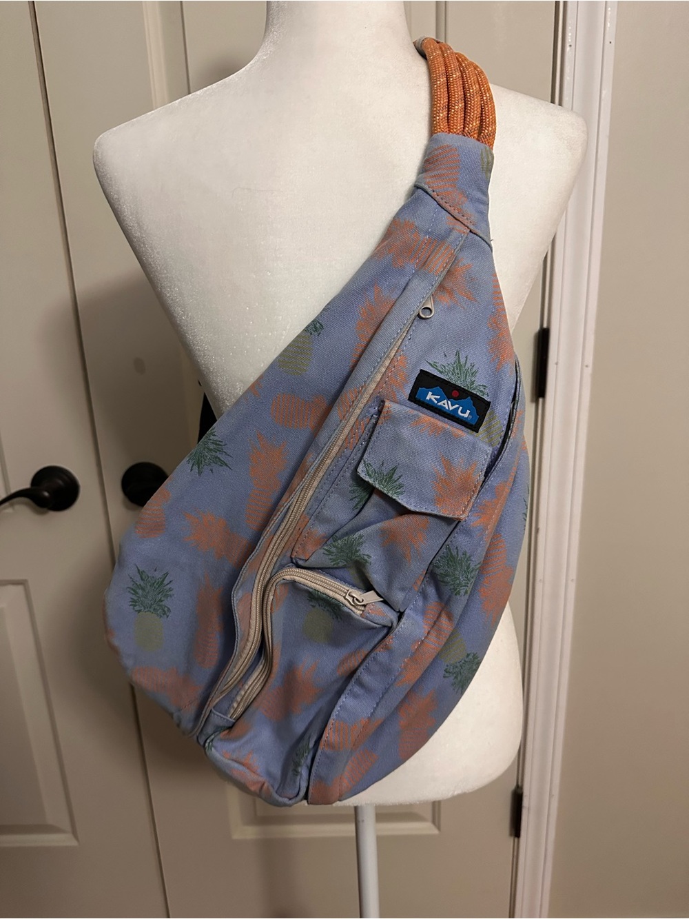 Kavu Pineapple Print Light Blue Sling Bag with Orange Strap